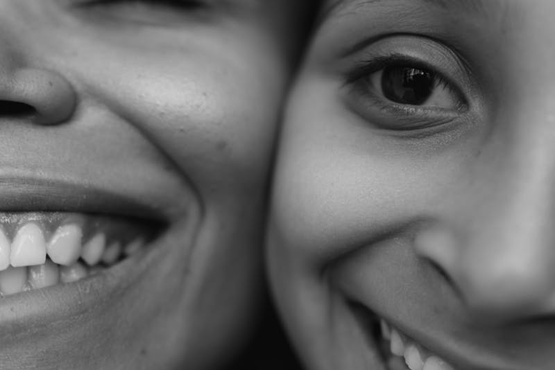mother and daughter smiling